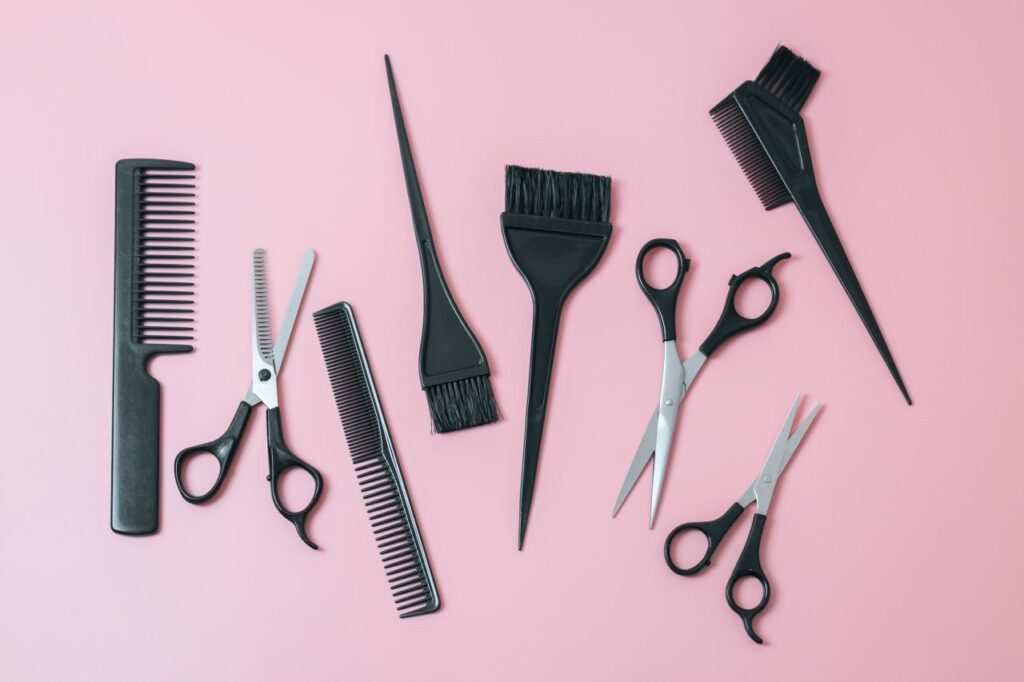 set-of-hairdresser-tools-on-a-pink-background-.jpg